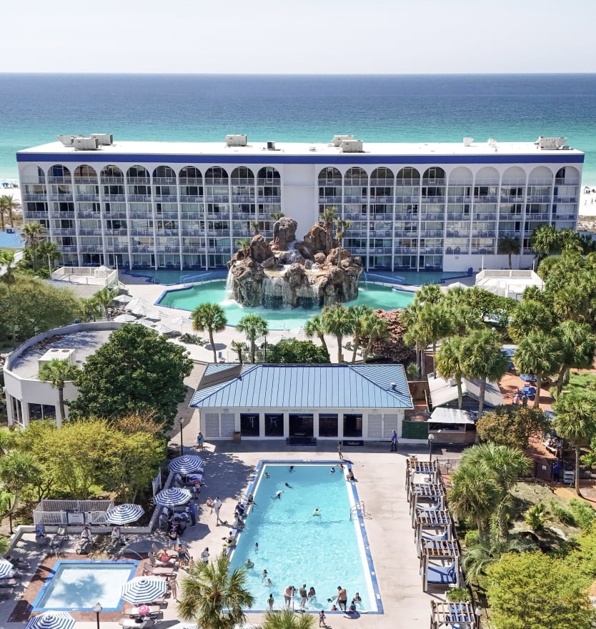 Aerial view of The Island Resort pools, Grotto Pool and the Gulf